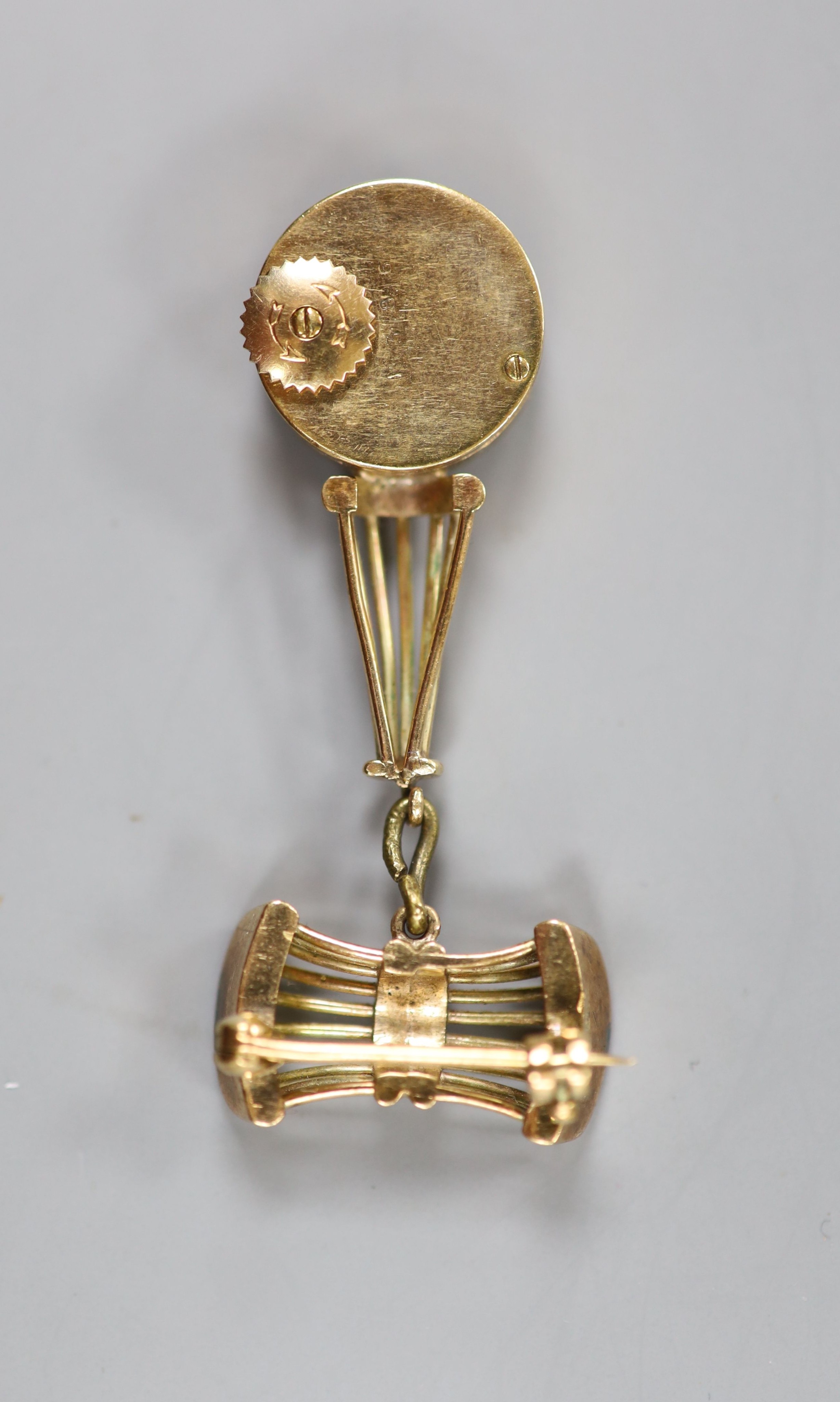 A lady's 9ct gold Jaeger LeCoultre manual back wind pendant watch on a 9ct gold suspension brooch, overall 50mm, gross weight 13.3 grams, case diameter 16mm, in fitted Jaeger LeCoultre box.